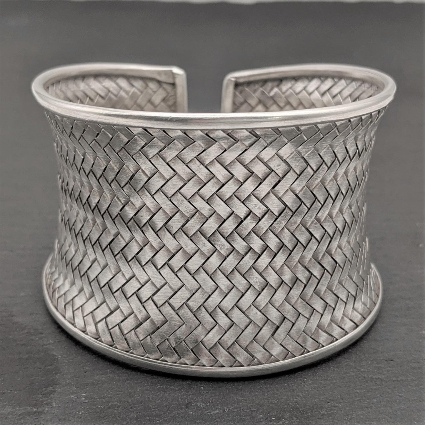
                  
                    Pure Silver Karen Hill Tribe Extra Wide Concave Woven Cuff Bangle
                  
                
