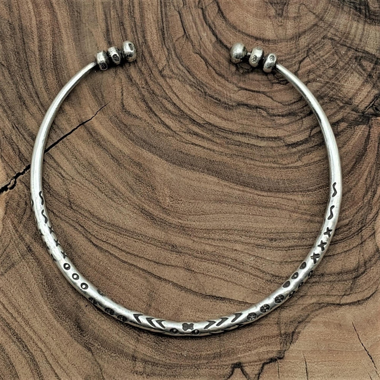 
                  
                    Pure Silver Hill Tribe Thin Tribal Motif Adjustable Torque Bangle
                  
                