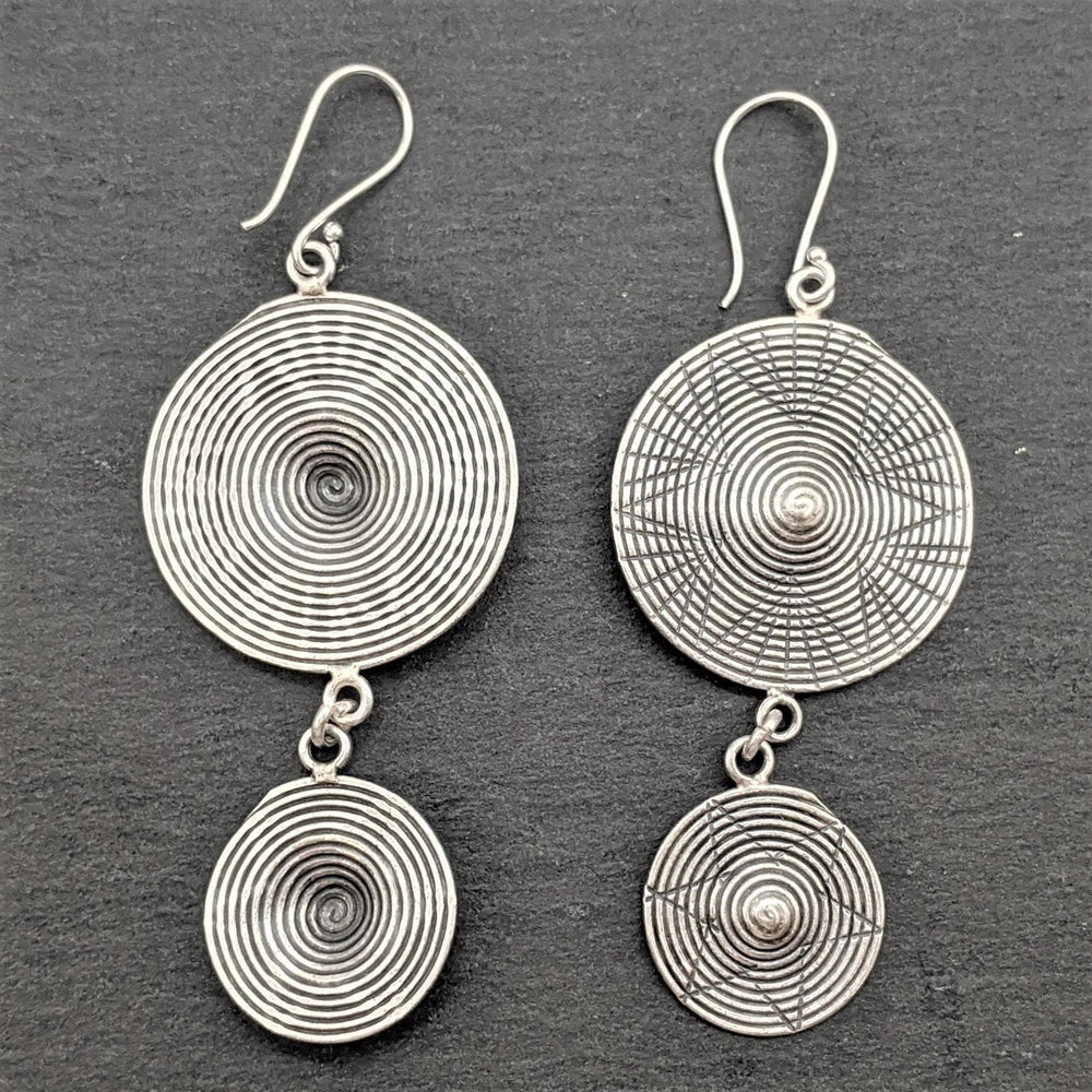 
                  
                    Pure Silver Karen Hill Tribe Double Disc Earrings w/ Spiral Star Motif
                  
                