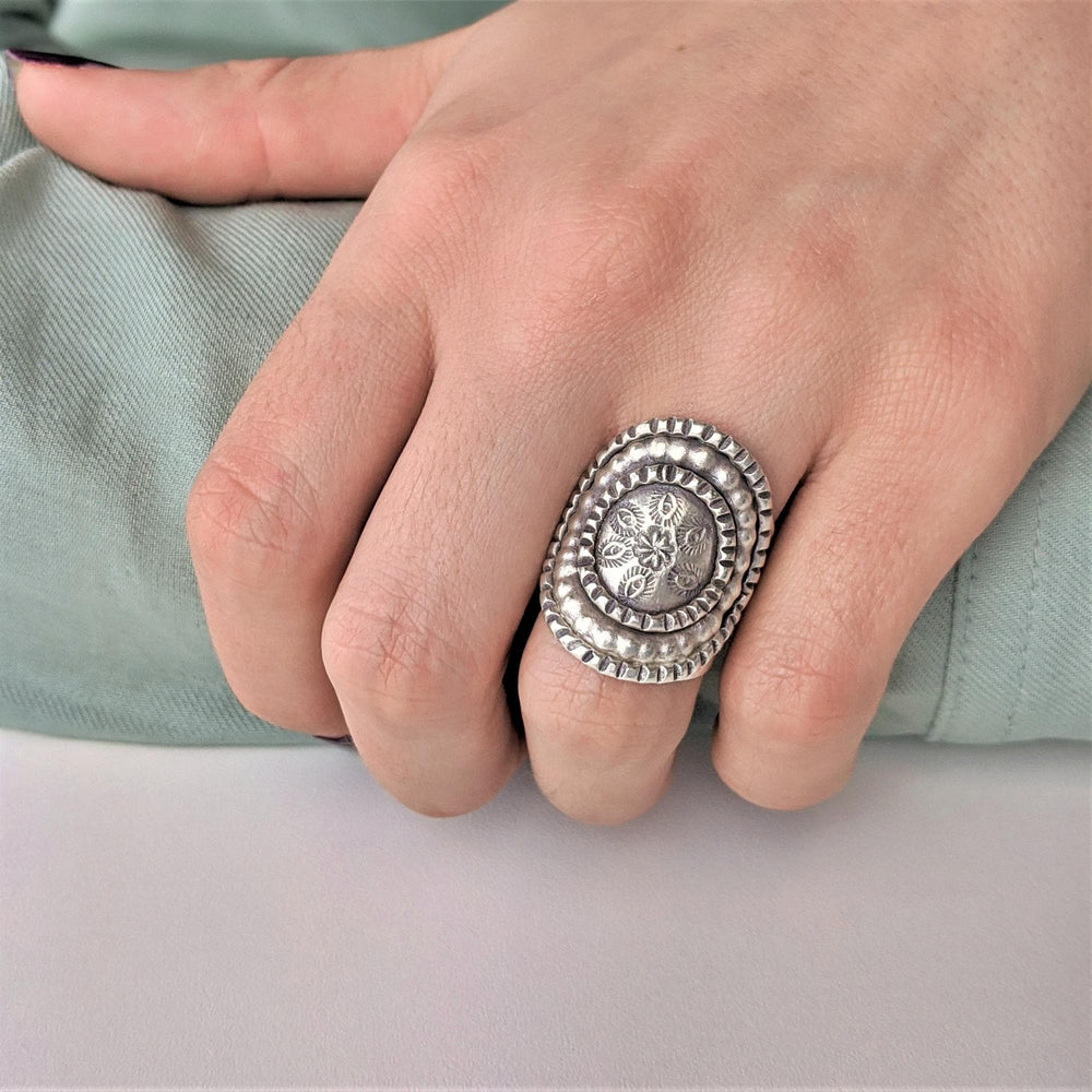 
                  
                    Pure Silver Hill Tribe Wide Oval Engraved Flower Motif Adjustable Ring
                  
                