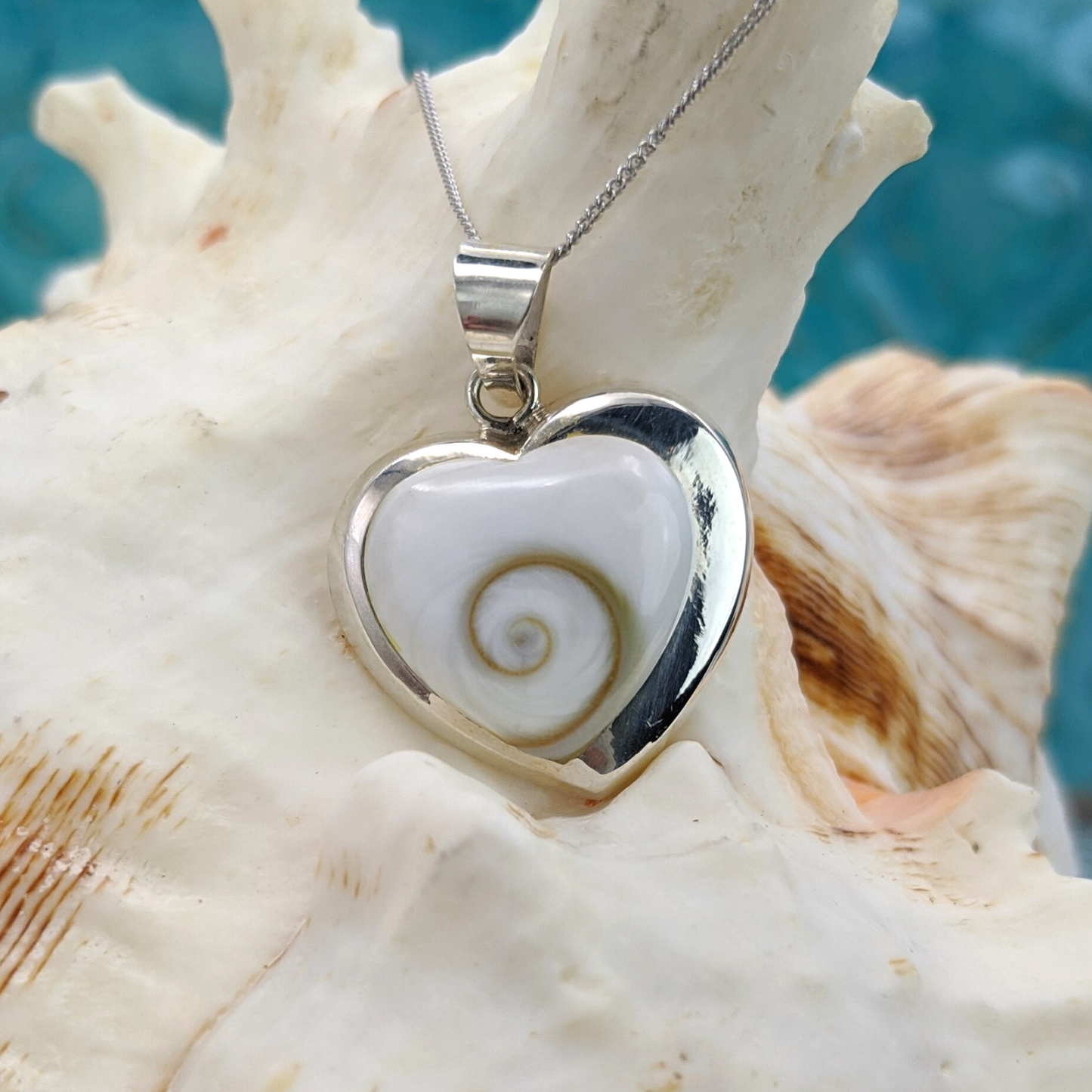 
                  
                    Sterling Silver Heart Shaped Shiva Eye Shell Inlay Pendant Necklace
                  
                