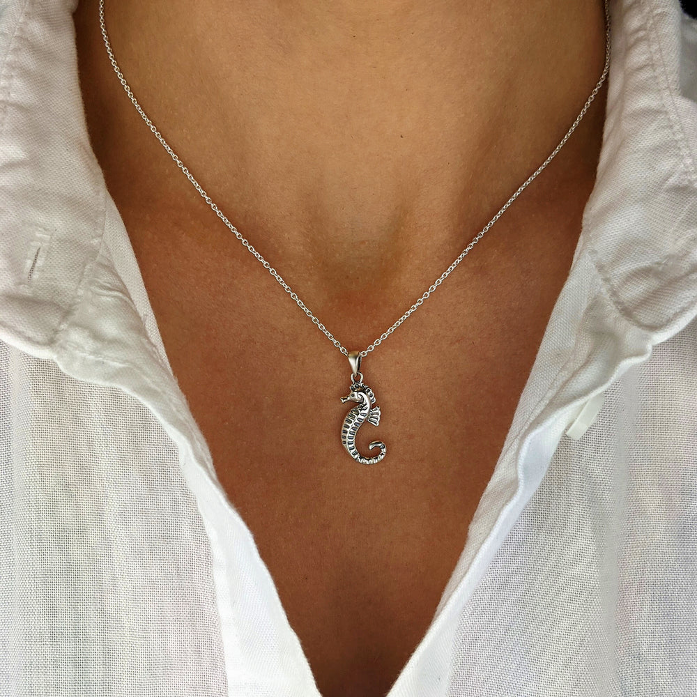 
                  
                    Sterling Silver Detailed Sea Horse Pendant Cable Chain Necklace
                  
                