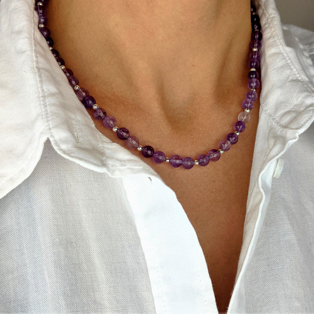 
                  
                    Sterling Silver Round Amethyst Beaded Purple Gemstone Strand Necklace
                  
                
