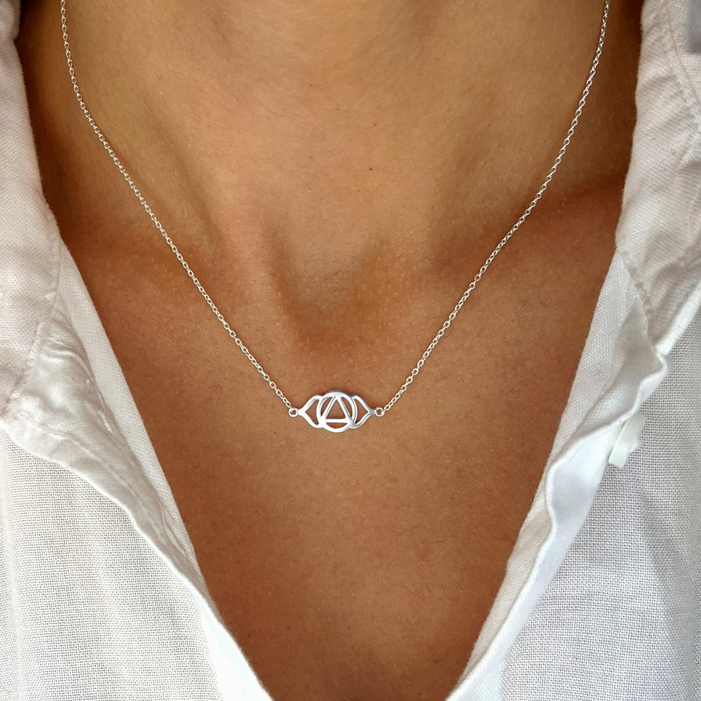 
                  
                    Sterling Silver Cut-Out Third Eye Chakra Pendant Cable Chain Necklace
                  
                