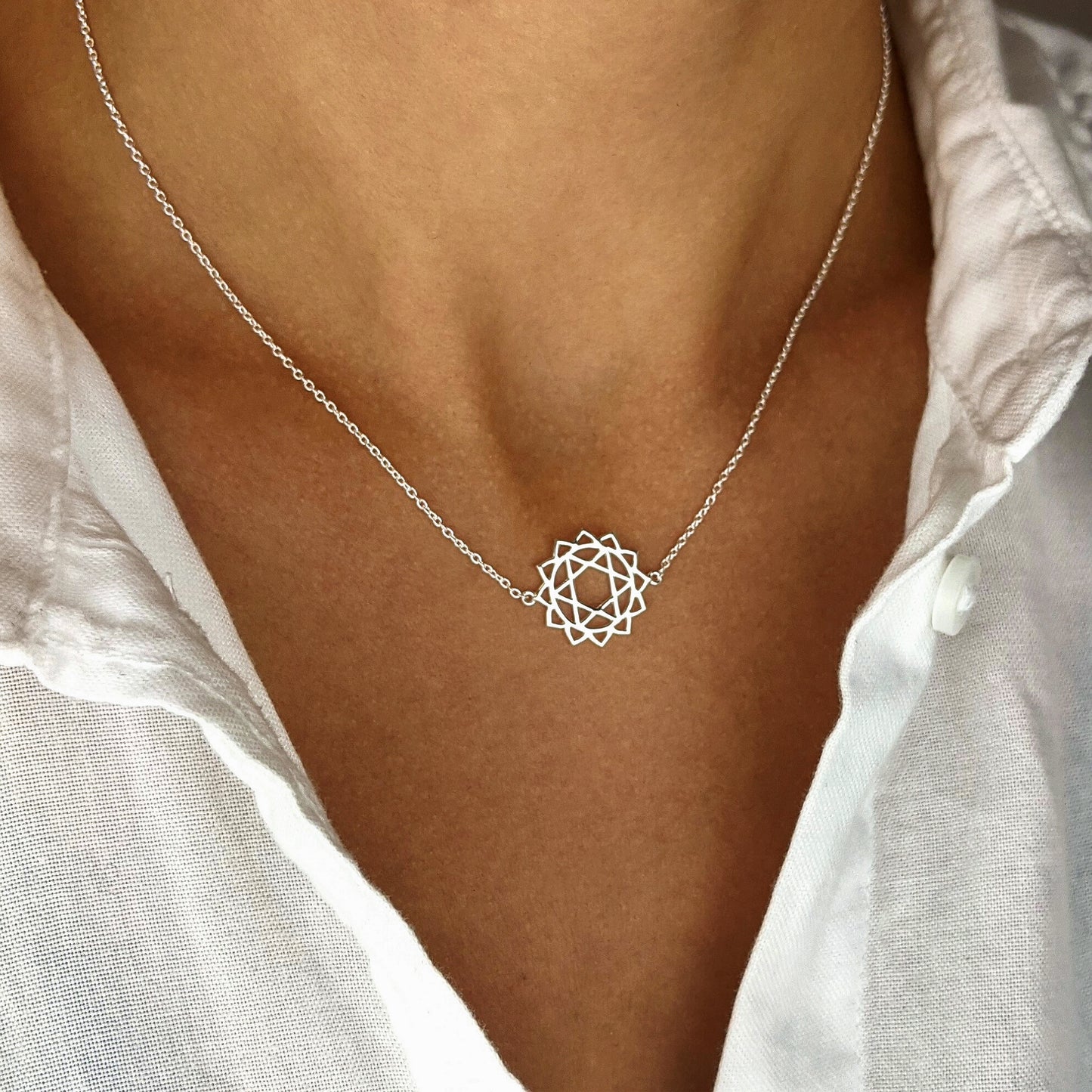 
                  
                    Sterling Silver Cut-Out Heart Chakra Pendant Yoga Cable Chain Necklace
                  
                