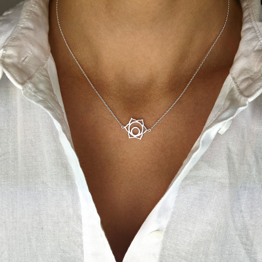 
                  
                    Sterling Silver Cut-Out Sacrum Chakra Pendant Cable Chain Necklace
                  
                