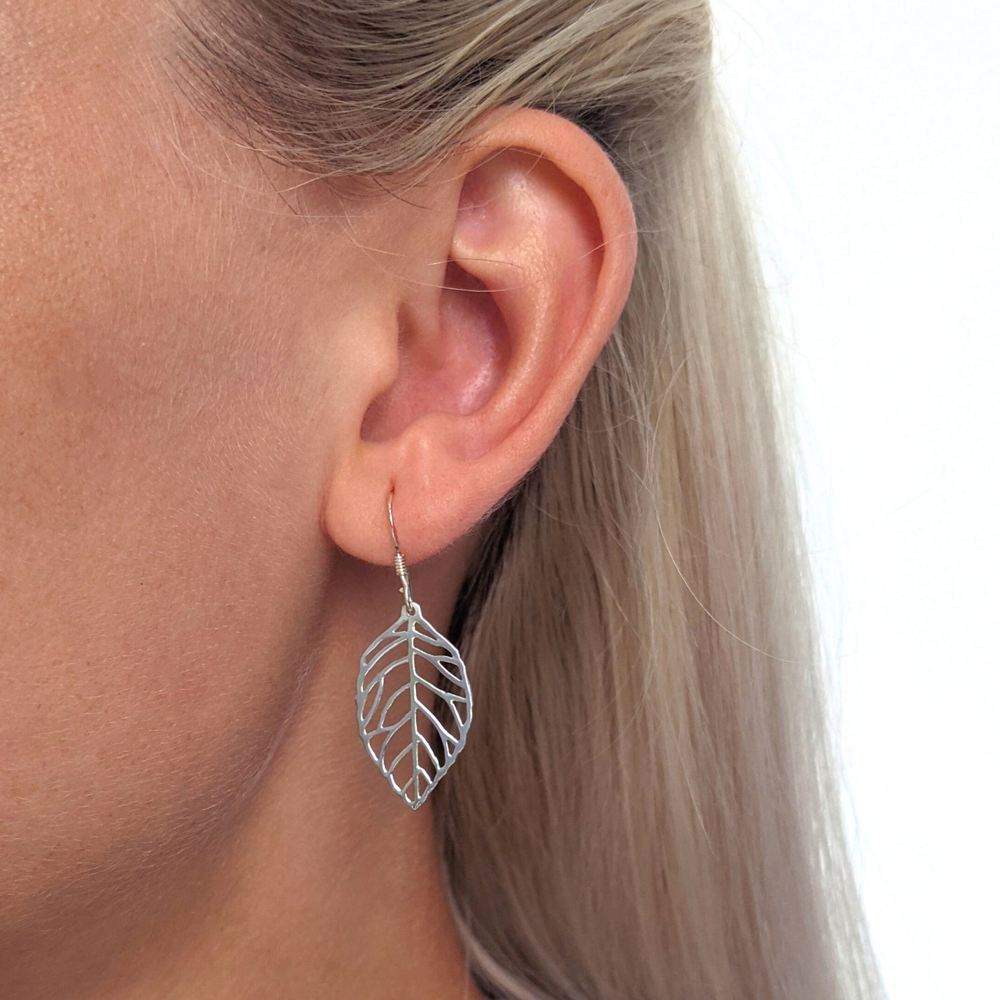
                  
                    Sterling Silver Cut-Out Leaf Dangle Earrings With Hooks Nature Design
                  
                
