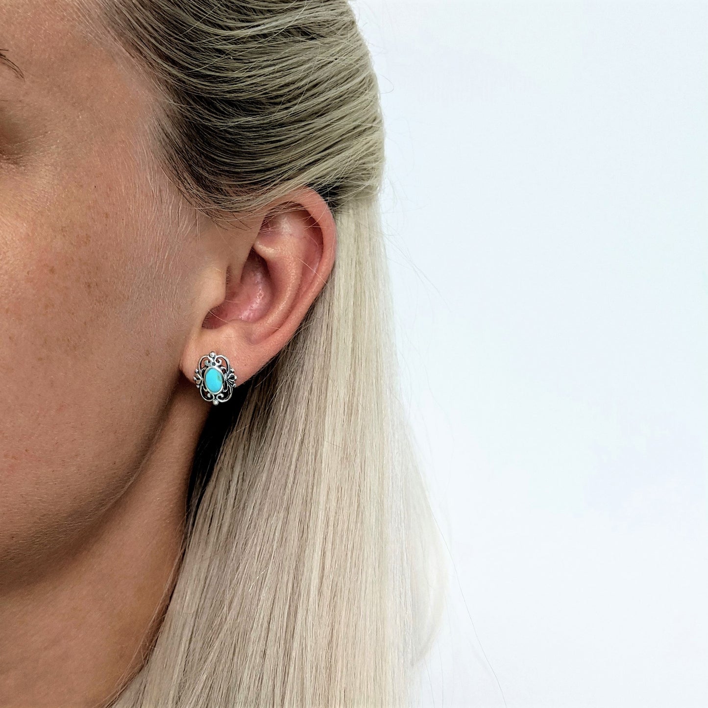 
                  
                    Sterling Silver Turquoise Studs Filigree Frame Stud Earrings
                  
                