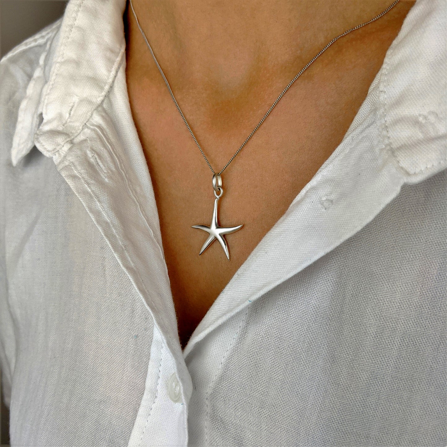 
                  
                    Sterling Silver Simple Starfish Pendant Necklace With 18" Chain
                  
                