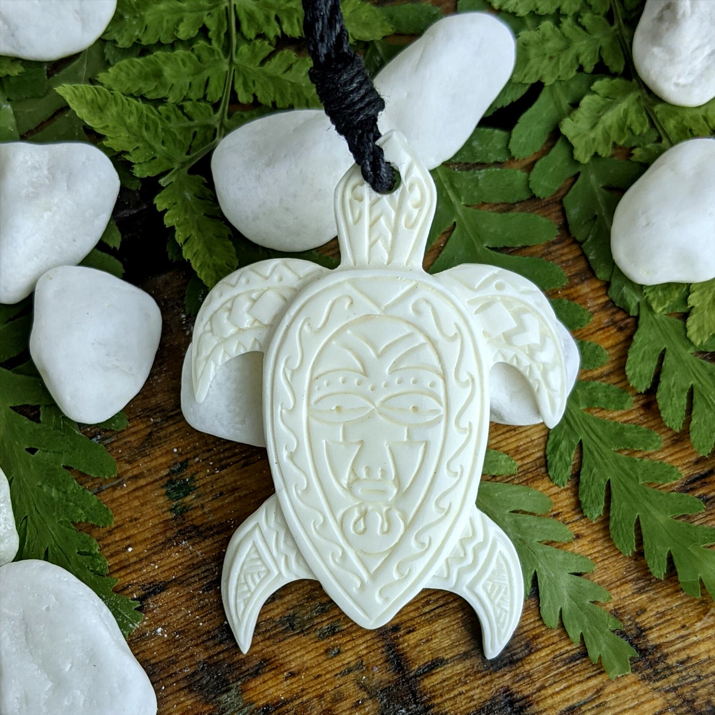 
                  
                    Bone Maori Style Mask Engraved Turtle Pendant Tribal Cord Necklace
                  
                