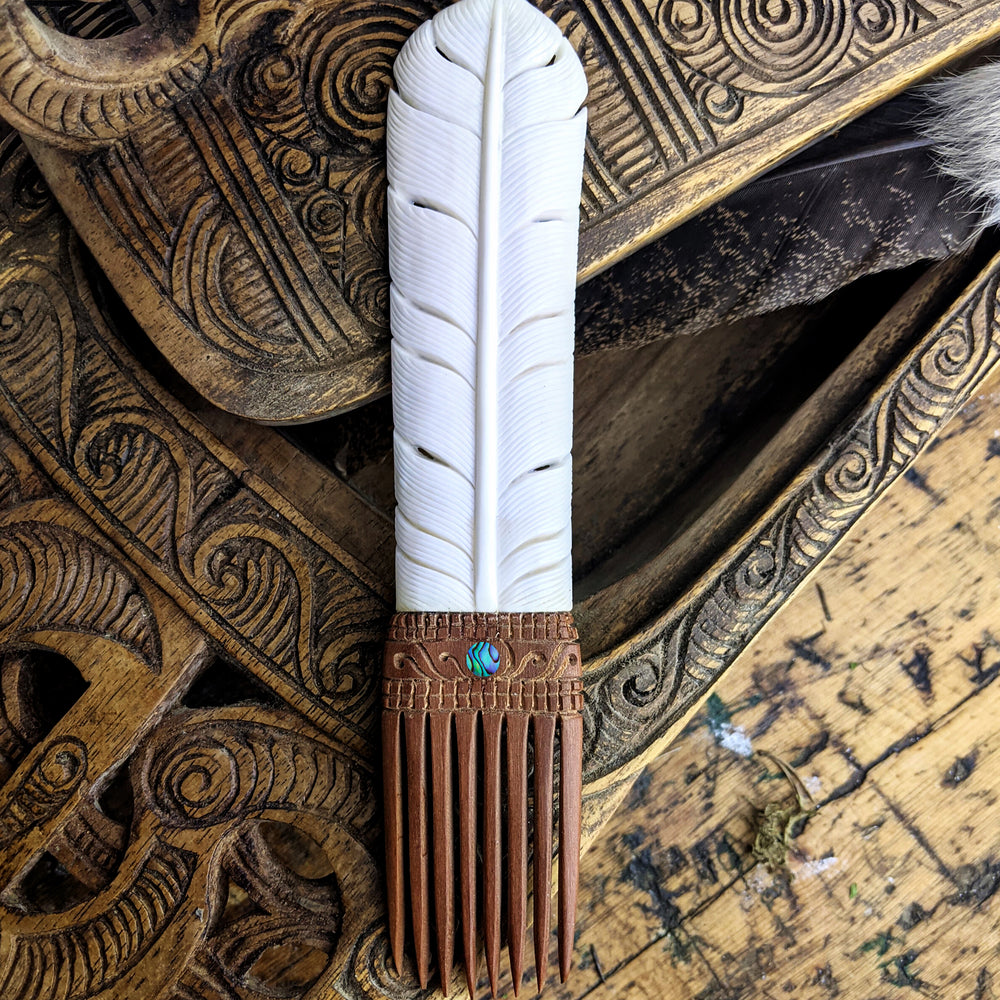 
                  
                    Bone Wood Abalone Shell Maori Style Tribal Huia Feather Hair Comb
                  
                