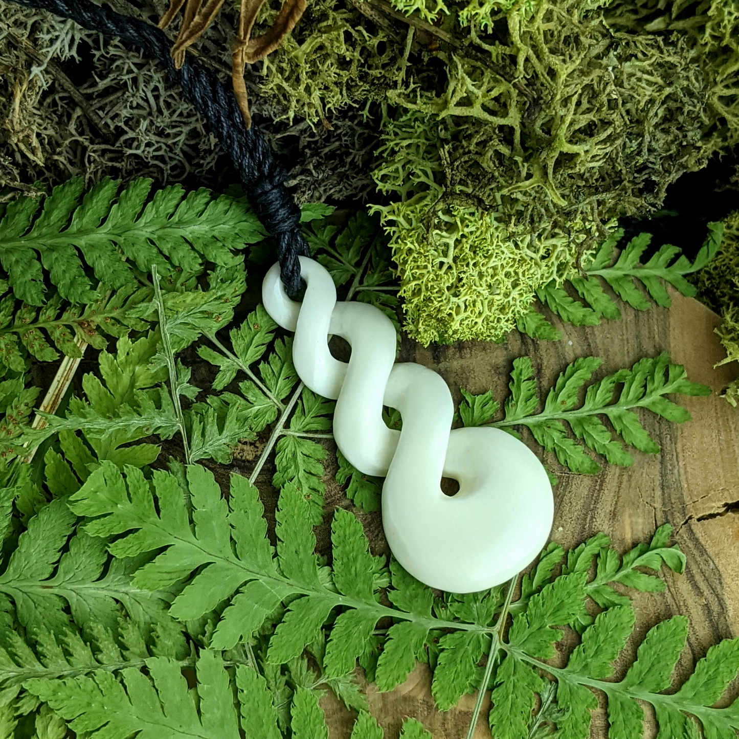 
                  
                    Bone Maori Style Tribal Triple Twist Pikorua Pendant Cord Necklace
                  
                