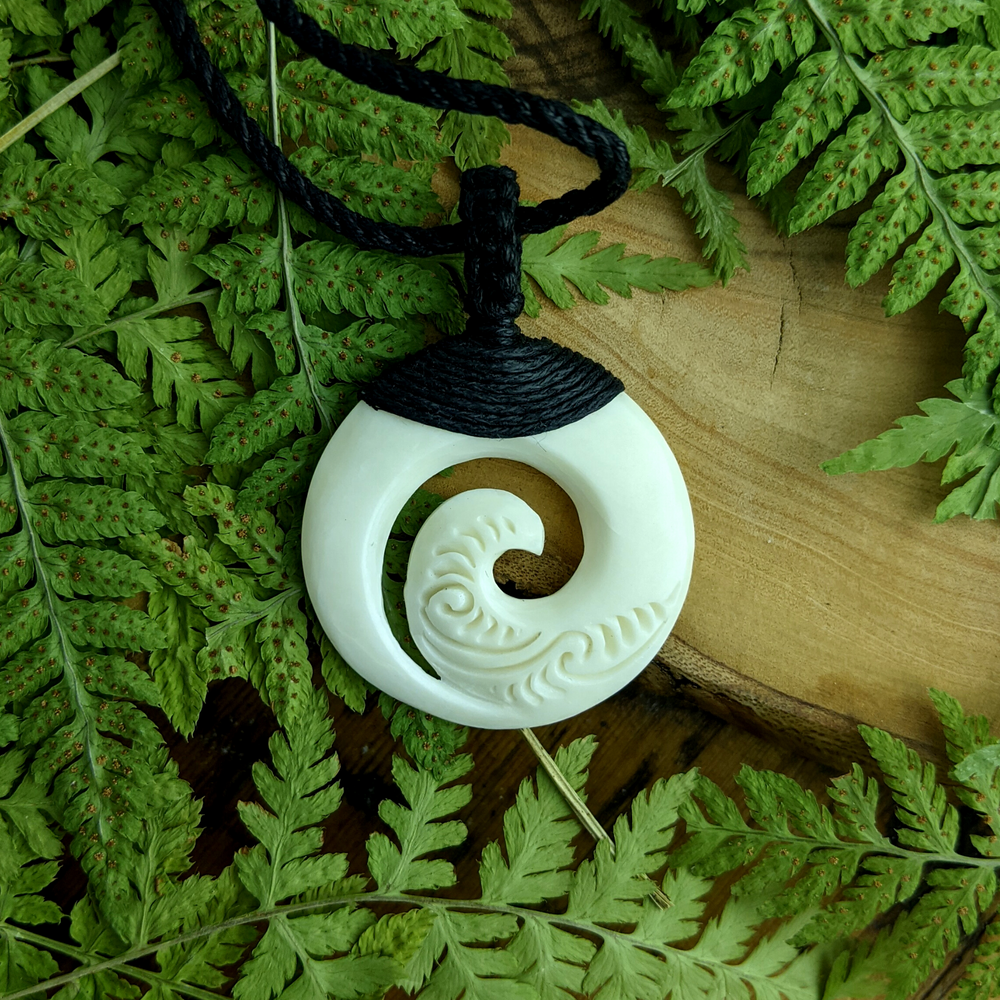 
                  
                    Bone Maori Style Koru Spiral Round Pendant Tribal Cord Necklace
                  
                
