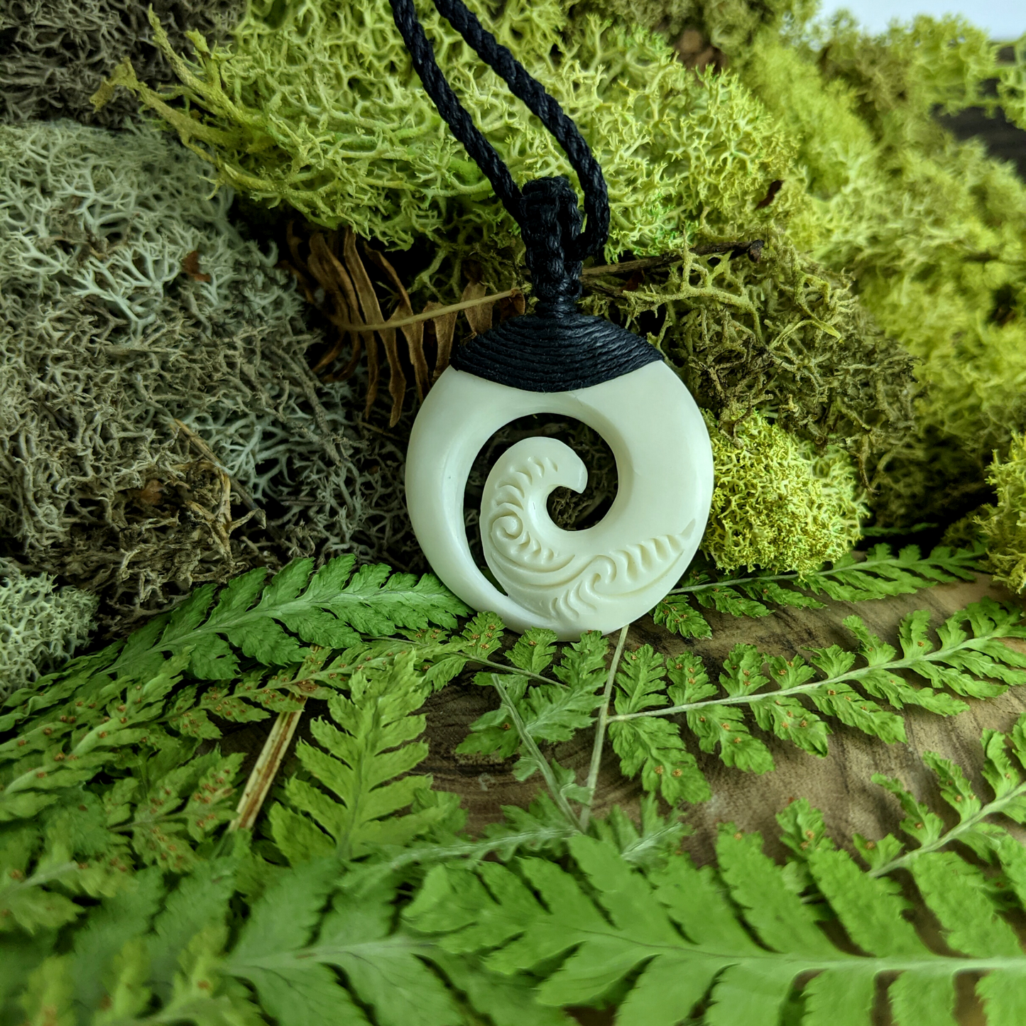
                  
                    Bone Maori Style Koru Spiral Round Pendant Tribal Cord Necklace
                  
                
