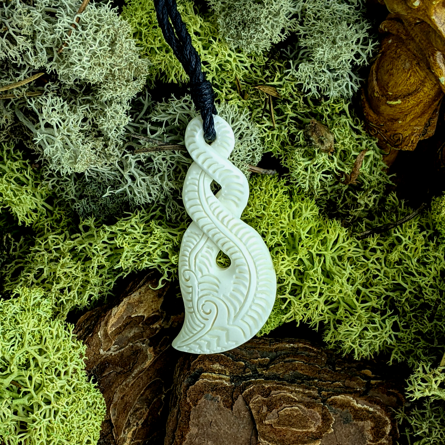 
                  
                    Bone Engraved Double Twist Pikorua Pendant Maori Style Cord Necklace
                  
                