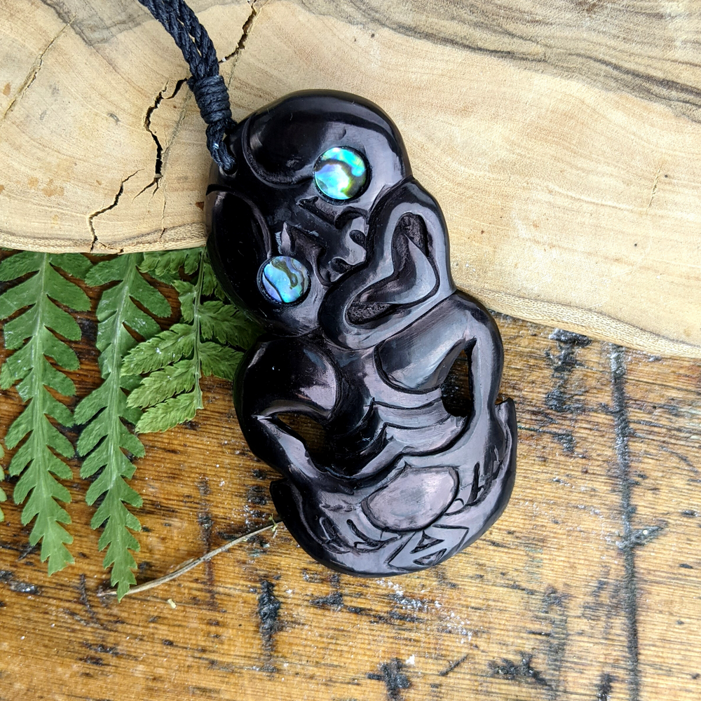 Putiputi Pounamu Hei Tiki - Flower Jade Pendant - Sands Carving Studio