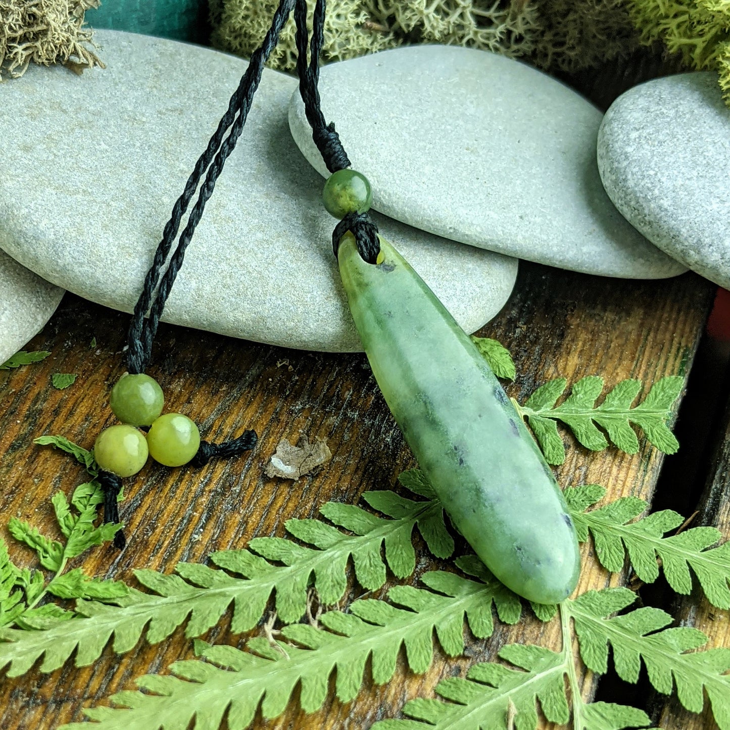 
                  
                    Nephrite Jade Maori Style Teardrop Roimata Pendant Cord Necklace
                  
                