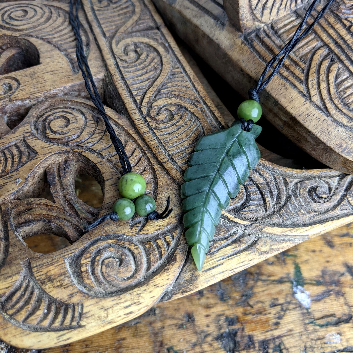 
                  
                    Nephrite Jade Maori Style Fern Leaf Pendant Tribal Cord Necklace
                  
                