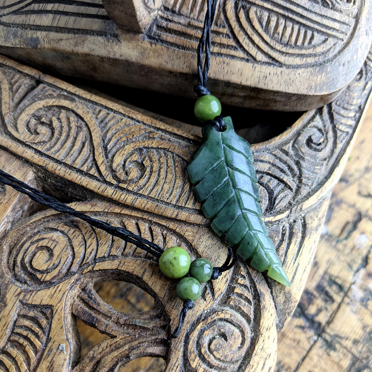 
                  
                    Nephrite Jade Maori Style Fern Leaf Pendant Tribal Cord Necklace
                  
                