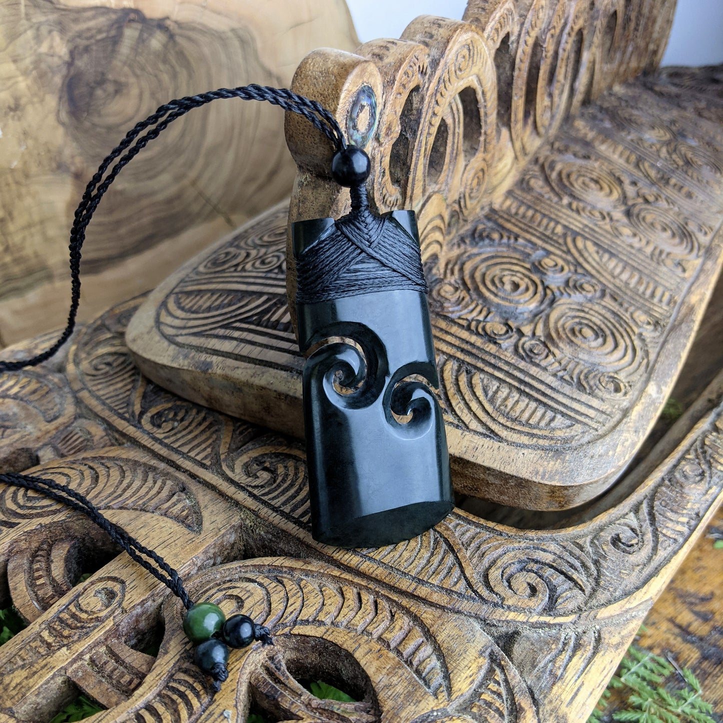 
                  
                    Dark Nephrite Jade Maori Style Toki Double Koru Pendant Cord Necklace
                  
                