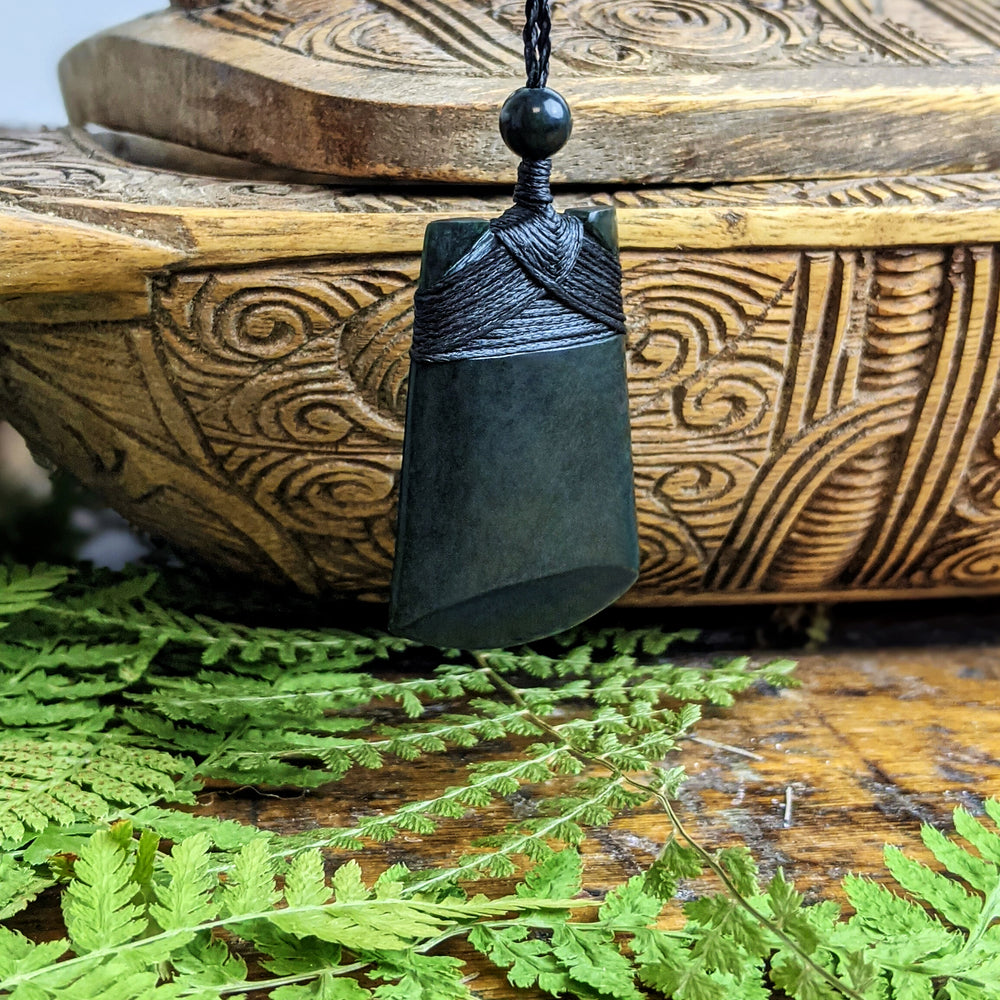 
                  
                    Dark Nephrite Jade Maori Style Toki Blade Pendant Cord Necklace
                  
                