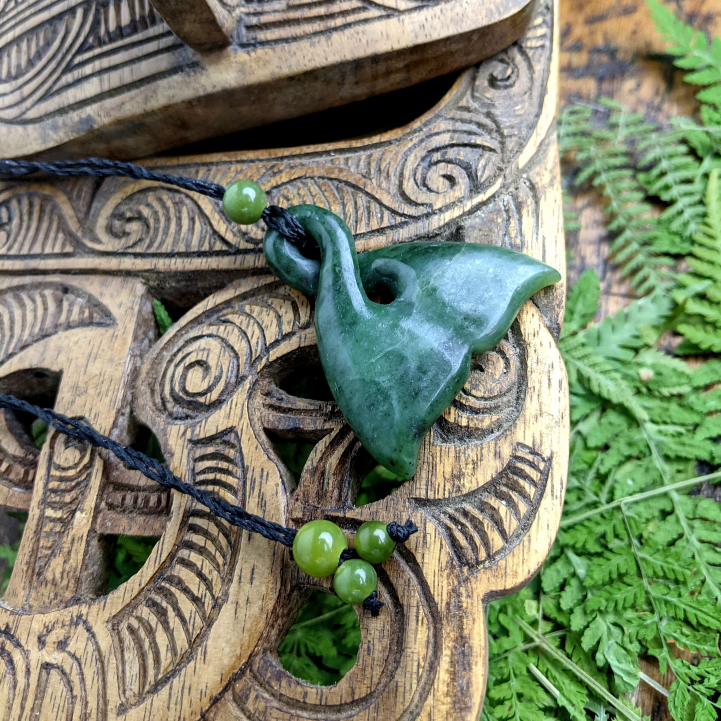 
                  
                    Nephrite Jade Large Whale Tail Pikorua Pendant Tribal Cord Necklace
                  
                