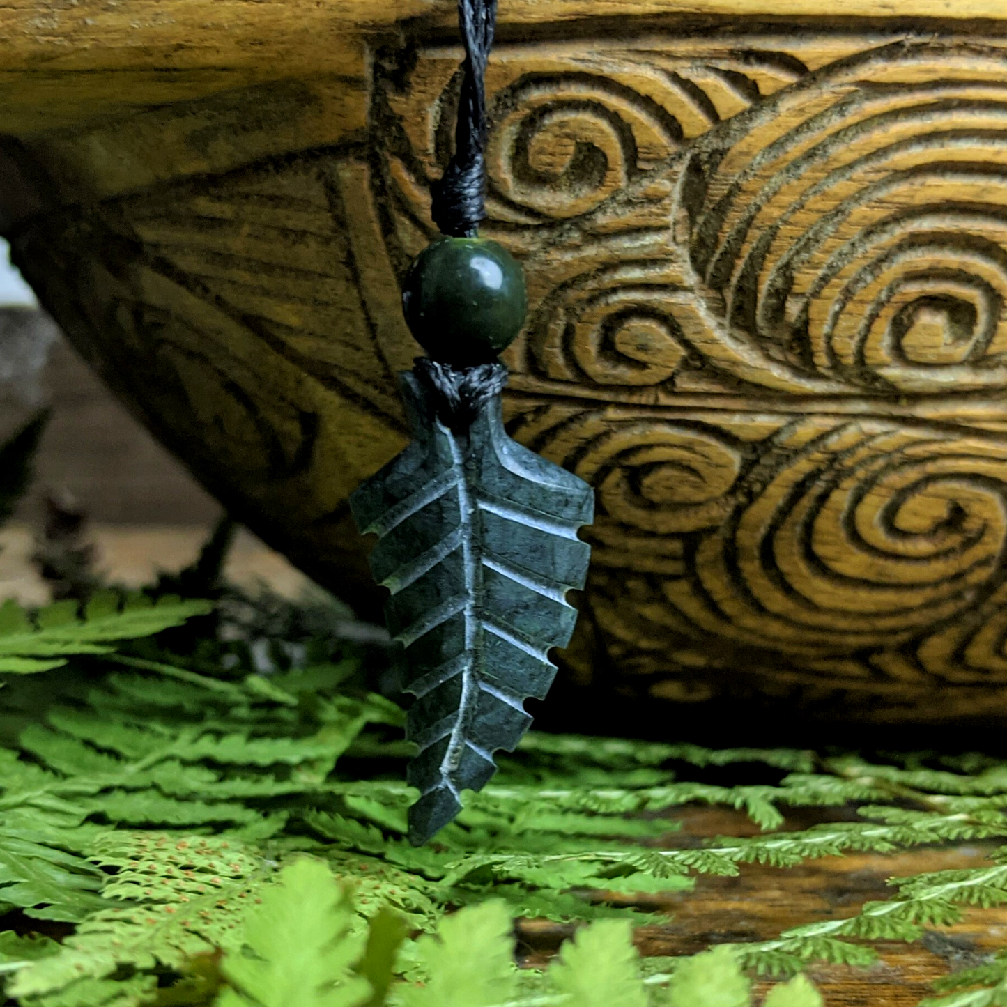 
                  
                    Black Nephite Jade Gemstone Small Fern Leaf Pendant Cord Necklace
                  
                