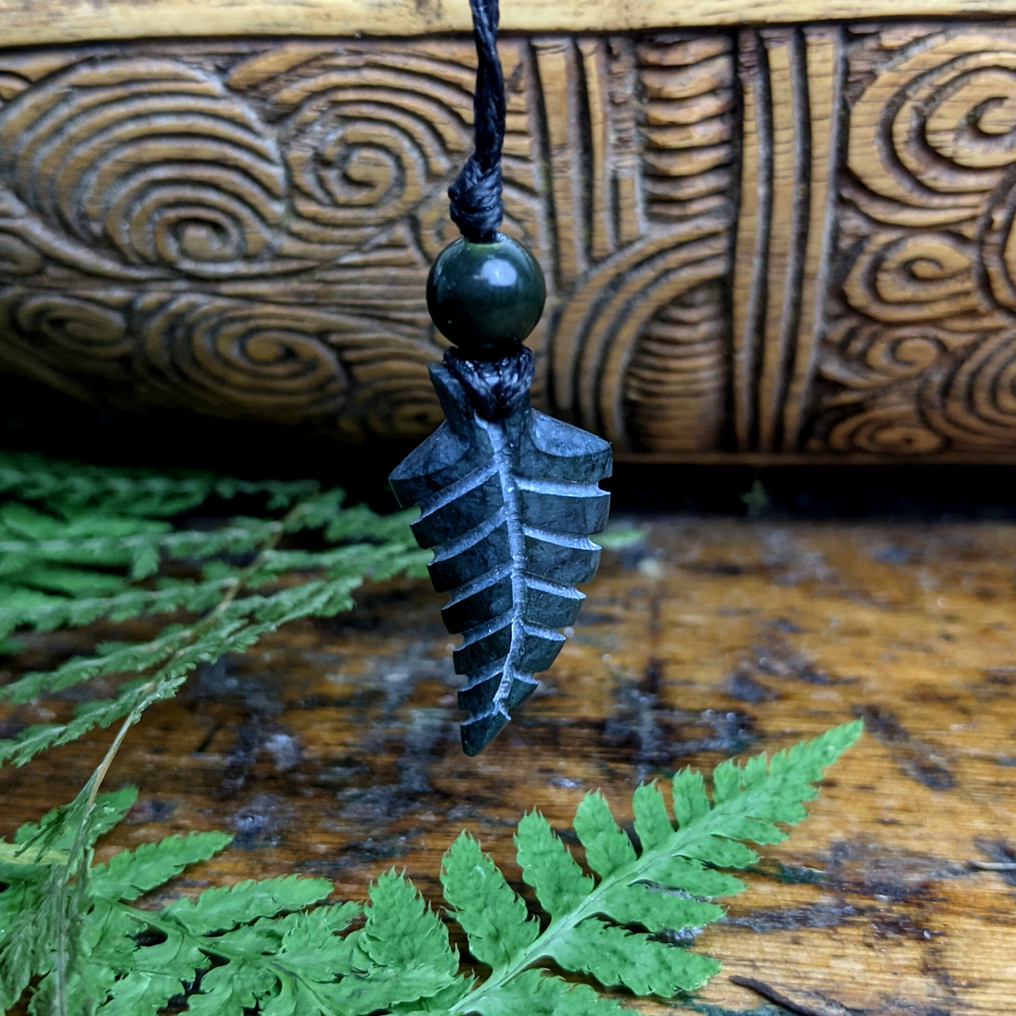 
                  
                    Black Nephite Jade Gemstone Small Fern Leaf Pendant Cord Necklace
                  
                