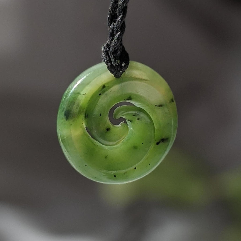 
                  
                    Nephrite Jade Maori Style Round Double Koru Pendant Cord Necklace
                  
                