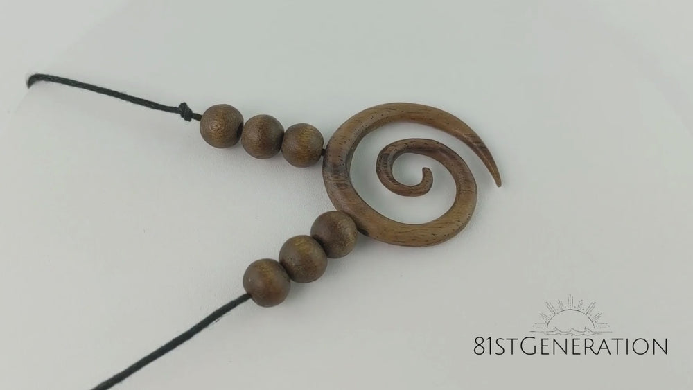 
                  
                    Load and play video in Gallery viewer, Wood Round Spiral Pendant Tribal Beaded Necklace With Adjustable Cord
                  
                