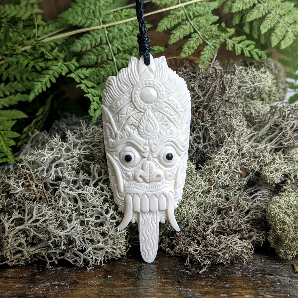
                  
                    Bone Hand Carved Balinese Barong Mask Keket Pendant Cord Necklace
                  
                